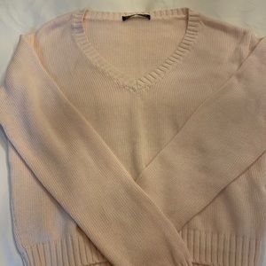 Pale pink, V-neck knit sweater